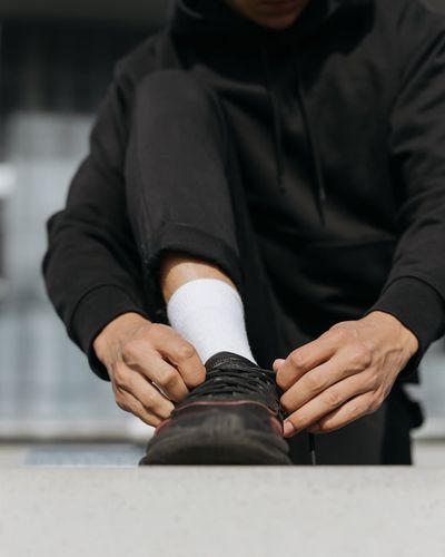 Close-up of feet on a mat, ready for an exercise.